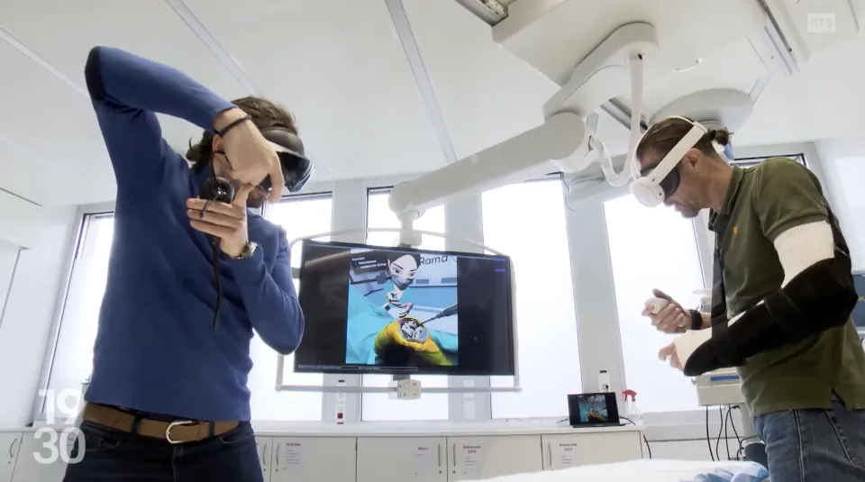 a surgeon is guiding a physician in training through a VR simulation. Both are wearing VR headsets and cooperating in a virtual OR.